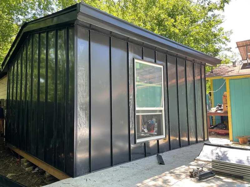 Black standing seam metal wall panels for Roof Inspection in Columbus