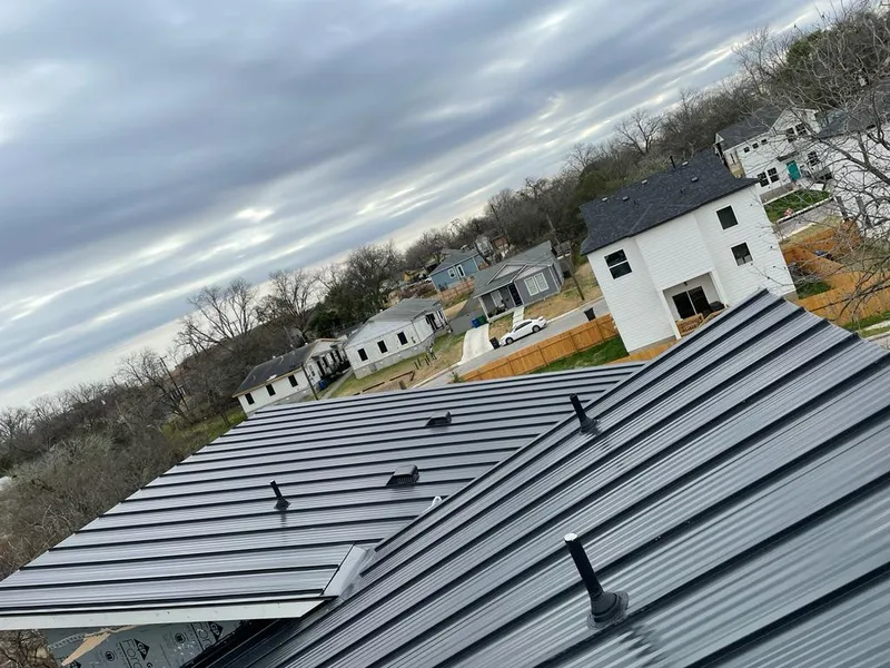 Standing seam metal roof panels with vents for Skylight Repair in Columbus